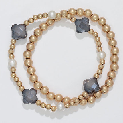 Periwinkle bracelet - gold beads with black clover