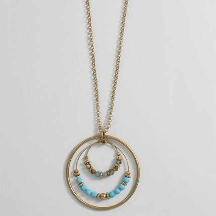 Periwinkle Necklace Gold Circle w/ Turquoise accents