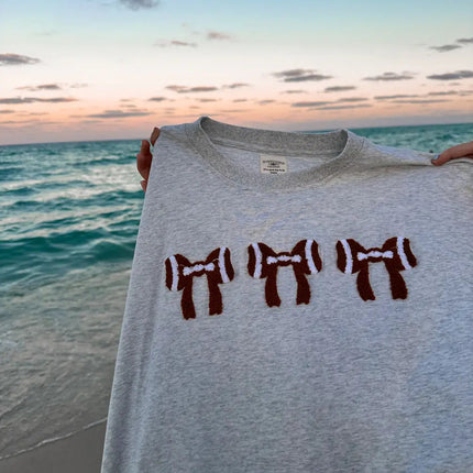 SUNKISSEDCOCONUT Football Bows Embroider Tee