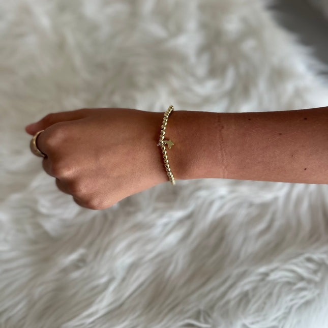 Gold Beaded Bracelet with Butterfly Charm